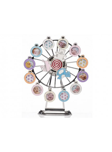 A silver-plated musical Ferris wheel with photo frames, featuring a teddy bear in the center, crystal surrounded apertures, and metal decorations.